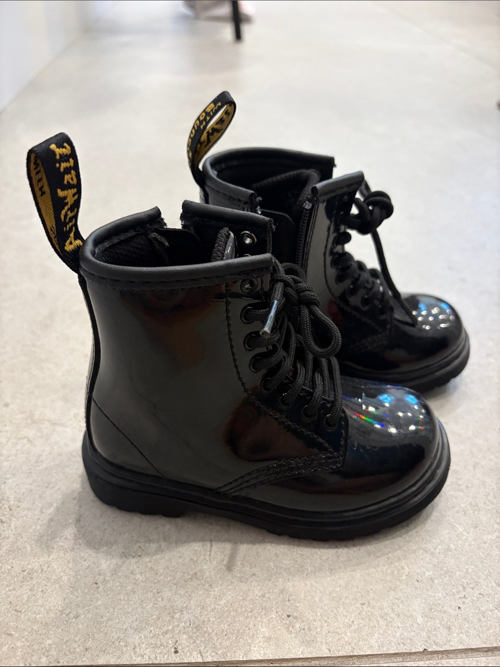 Dr. Martens Kids Black Patent Lace-Up Ankle Boots with Yellow Pull Tab